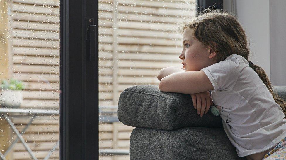 A girl looking out the window