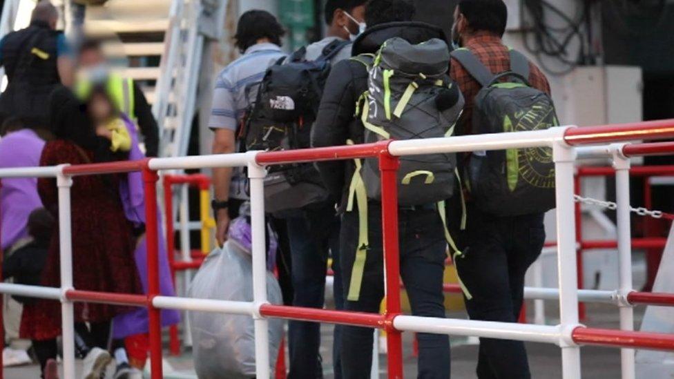 Refugees arriving at Birmingham Airport