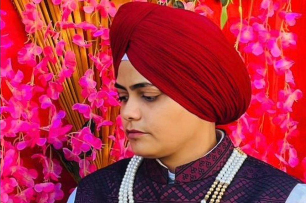 Dimple seen in a turban