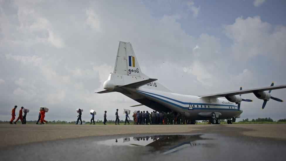 A Myanmar Air Force Shaanxi Y-8 transport aircraft being unloaded at Sittwe airport in Rakhine state, of the same type as the plane that is missing (file photo)