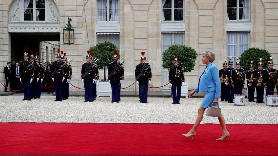 Brigitte Trogneux arrives to attend the handover ceremony between her husband, French President-elect Emmanuel Macron, and outgoing President Francois Hollande at the Elysee Palace in Paris, France, 14 May 2017.