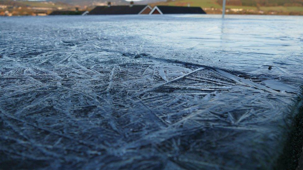 Ice on garage roof in New Inn