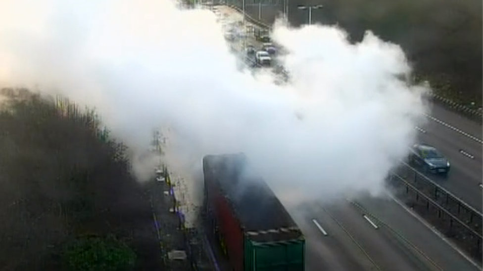 Smoke emitting from a lorry on the M6 motorway