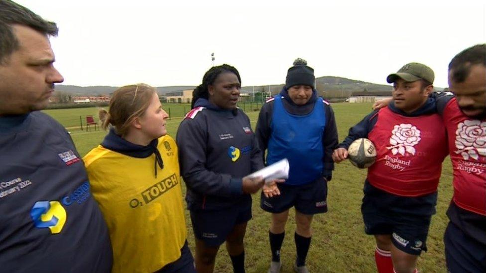 A group of former military personnel on a coaching course