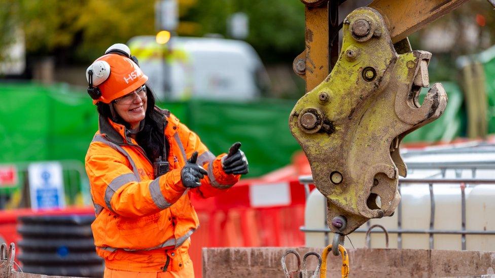 Elisabeta working on construction site