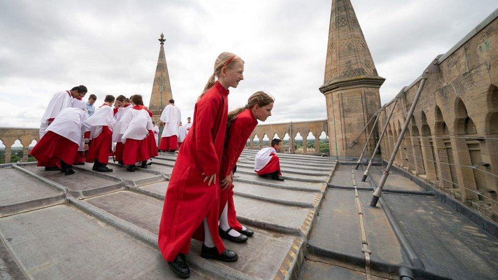 Choristers on top of St John's College Chapel tower