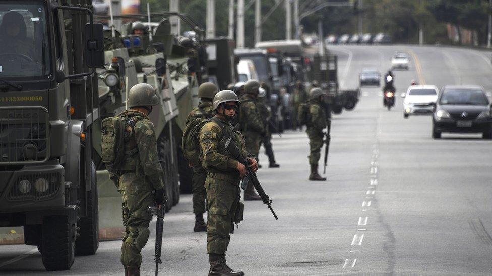 Brazilian marines deploy during a pre-dawn anti-gang operation in Niteroi, greater Rio de Janeiro, Brazil, on August 16, 2017