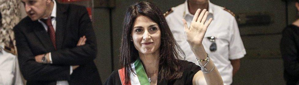 Rome Mayor Virginia Raggi (R) waves after her the first council meeting at Campidoglio Palace in Rome (7 July)