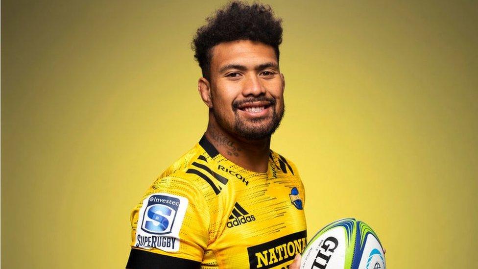 ardie-savea-holding-a-rugby-ball