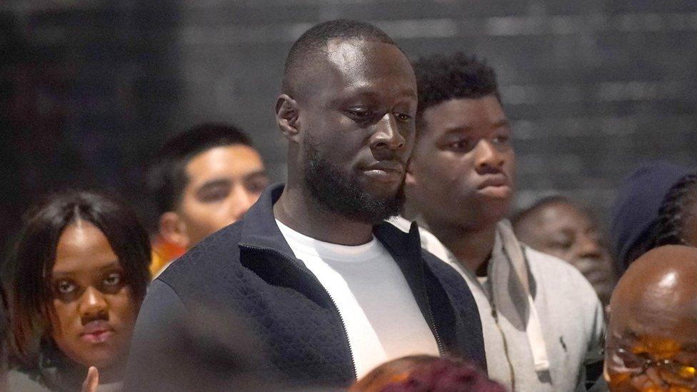 Stormzy attends the vigil