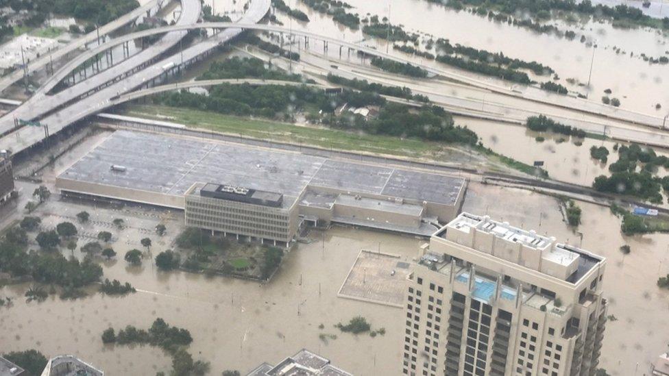 Photograph from high rise shows the scale of flooding overwhelming Houston