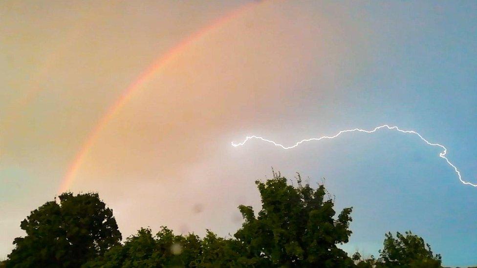 Rainbow and lightning