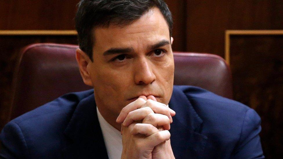 Spanish Socialist party (PSOE) leader Pedro Sanchez listens to a speech by Podemos party leader Pablo Iglesias (not pictured), during the the second session of the investiture debate at the Lower House of Spanish Parliament, in Madrid, Spain on 2 March 2016