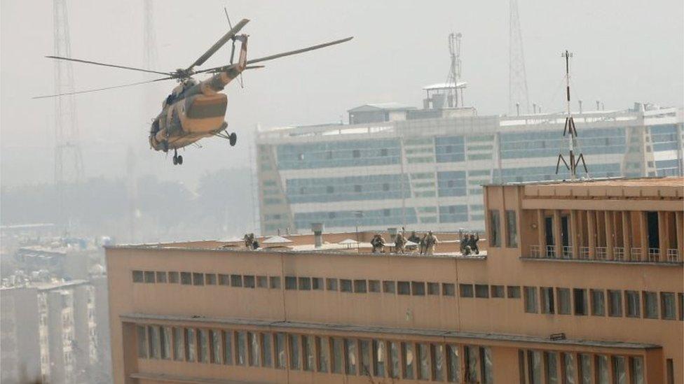 Afghan National Army (ANA) soldiers descend from helicopter on a roof of a military hospital during gunfire and blast in Kabul, Afghanistan March 8, 2017