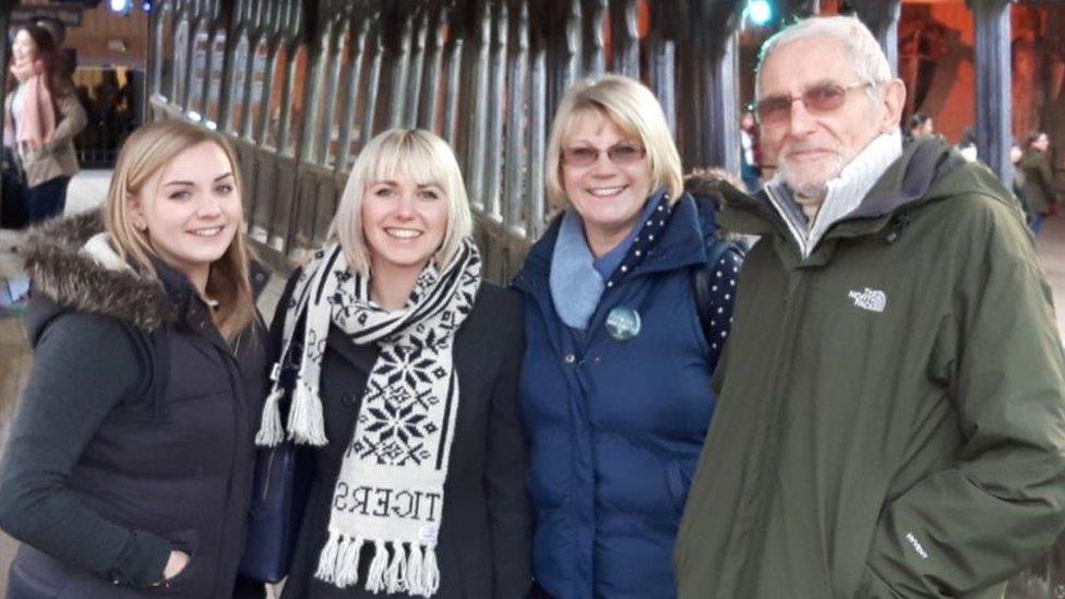 Annie White with her sister Jessie, mum Heather and dad John