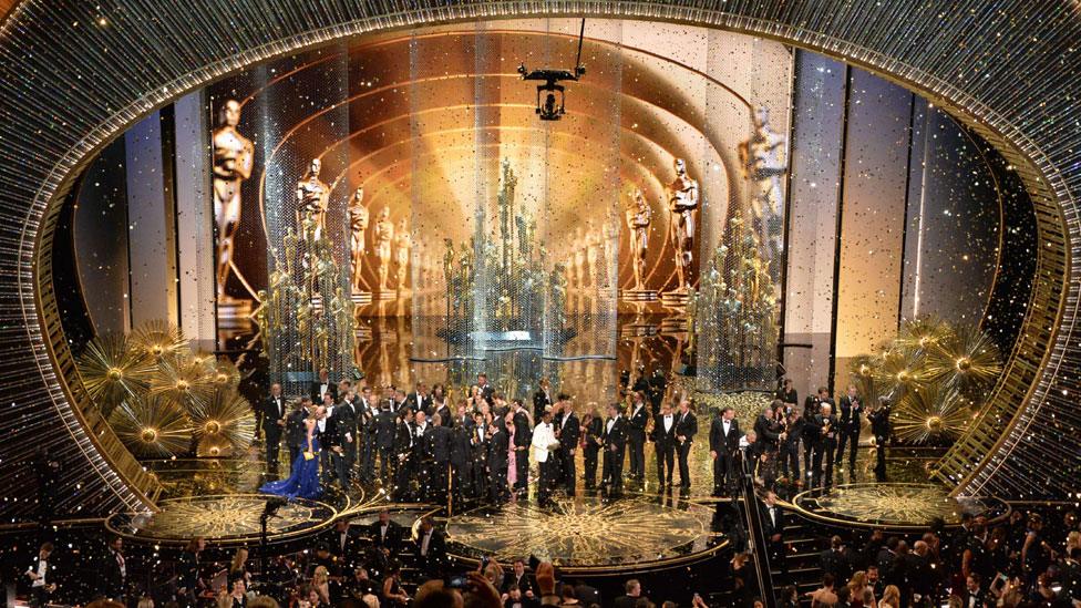 Winners on stage at the Oscars