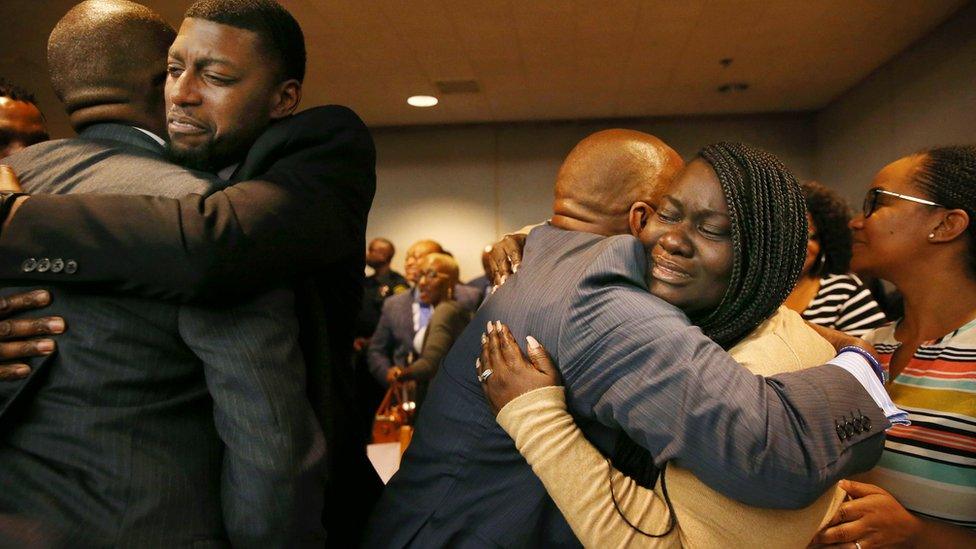 Odell Edwards and Charmaine Edwards, parents of Jordan Edwards, cry and hug prosecutors after Roy Oliver was found guilty of murder