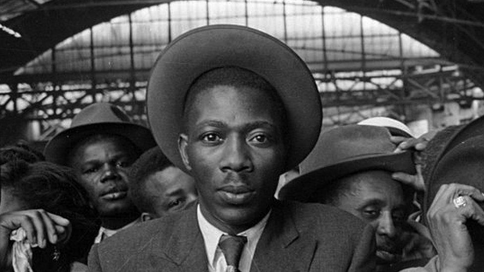 West Indian migrants arrive at Victoria Station, London, after their journey from Southampton Docks in 1956