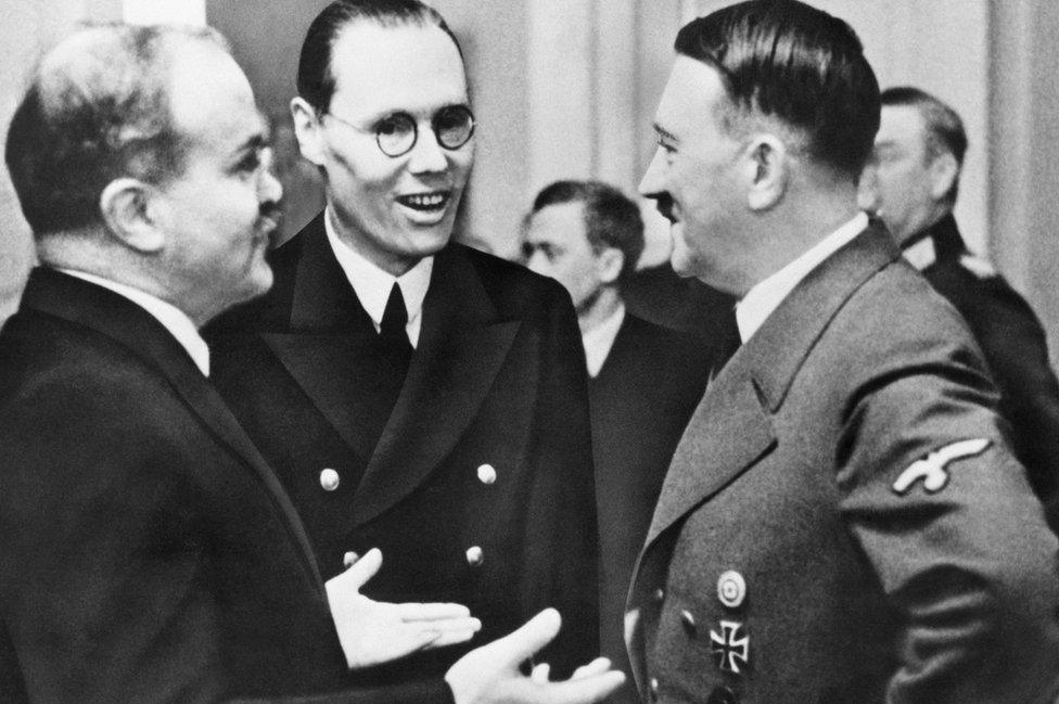 Soviet Foreign Minister Vyacheslav Molotov (L) with Nazi dictator Adolf Hitler