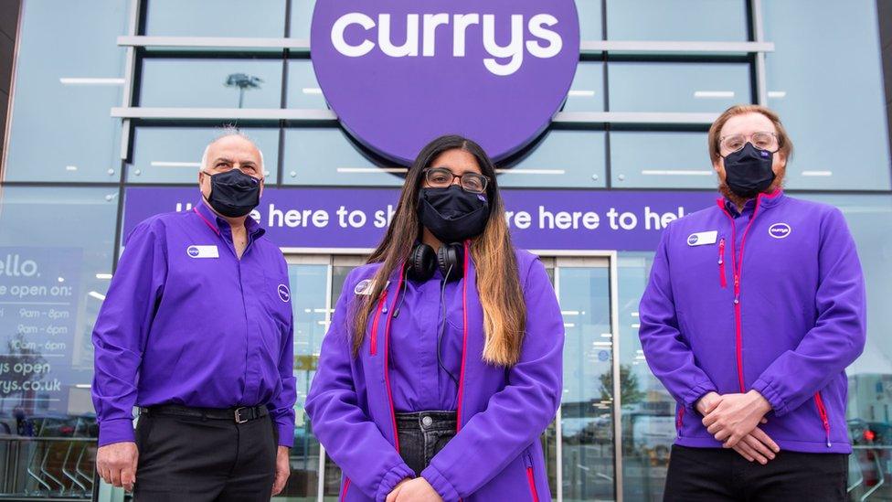 Currys branch with staff