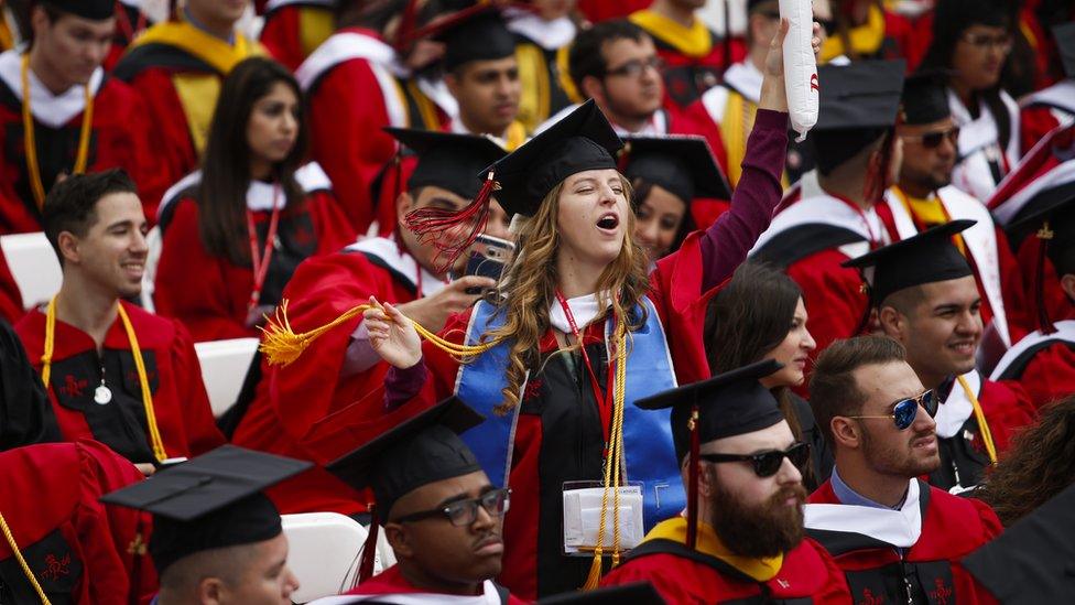 students at college graduation