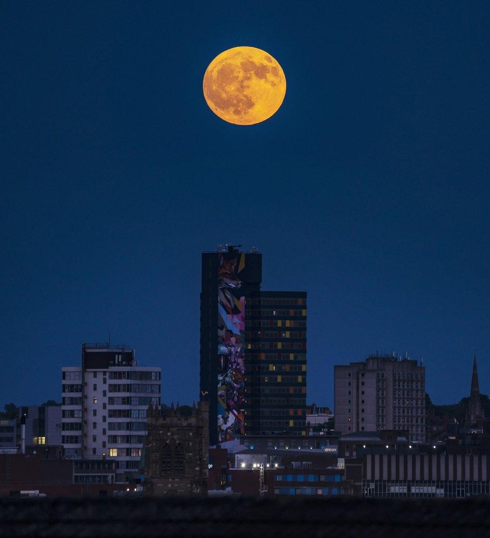 The Strawberry Moon looked golden over Europe's tallest street art in Leicester