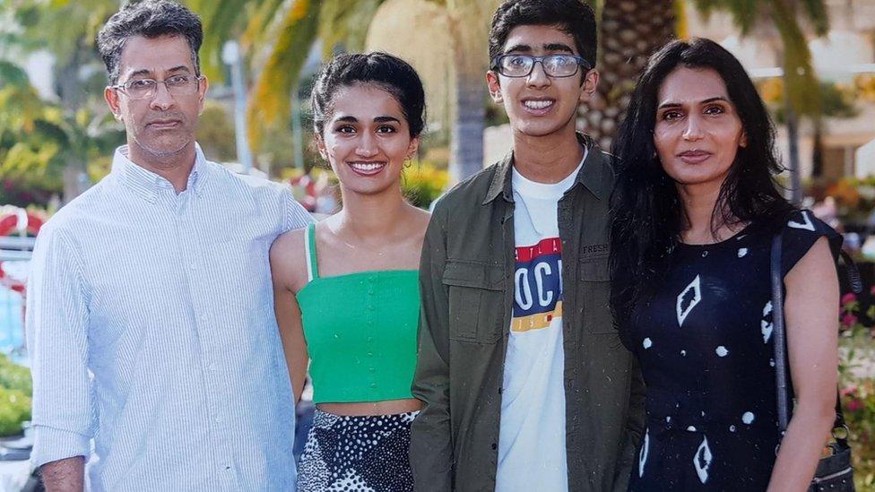 Rohan's father (left), sister, Rohan Godhania and his mother, Pushpa Godhania.