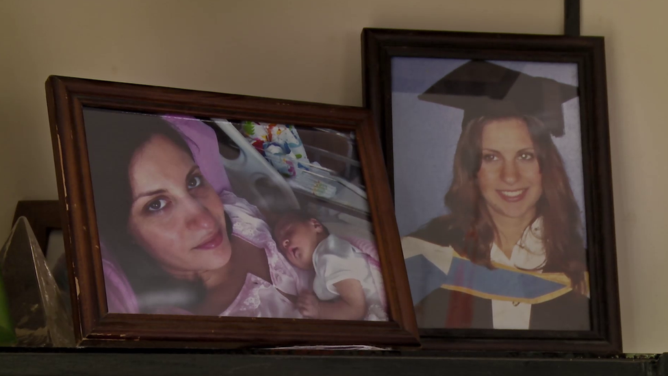 Framed photos of Kubra with her daughter and graduating