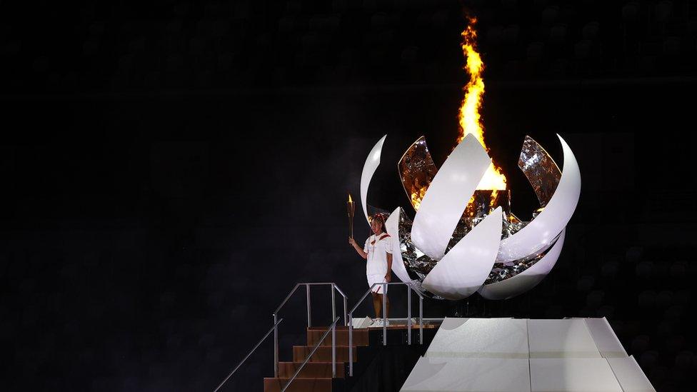 Naomi Osaka with the Olympic torch