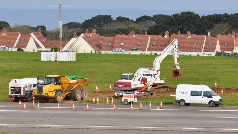 PFOS-contaminated soil being removed from next to Guernsey Airport runway, where a fire engine overturned