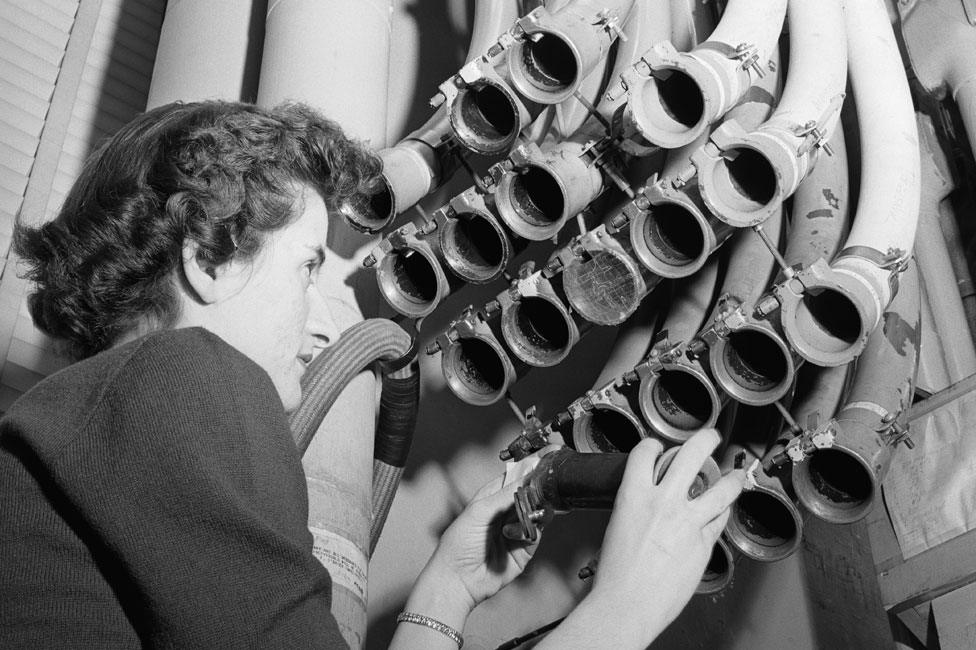 The 1955 pneumatic tube system in use in the New York office of financial company Merrill Lynch, Pierce, Fenner & Beane