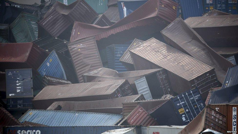 Shipping containers buckled in the aftermath of explosions at Tianjin