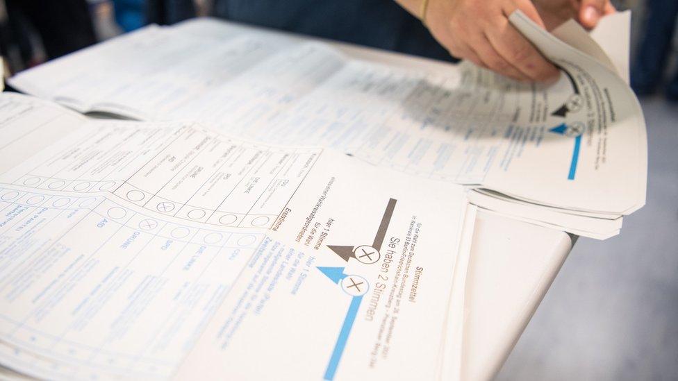 Volunteers count votes for the federal parliamentary elections on September 26, 2021 in Berlin, Germany