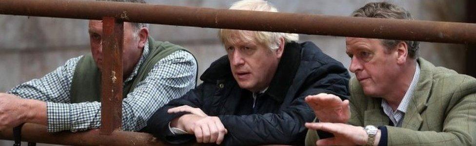 Boris Johnson with Scottish Secretary Alister Jack at a farm in Aberdeenshire