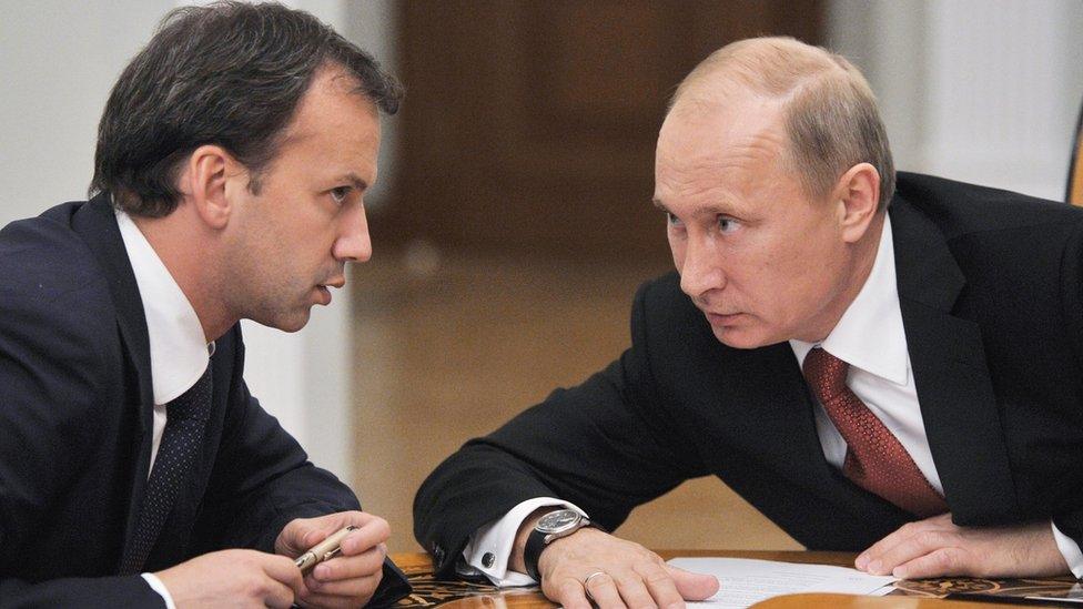 Arkady Dvorkovich speaks with Russian President Vladimir Putin