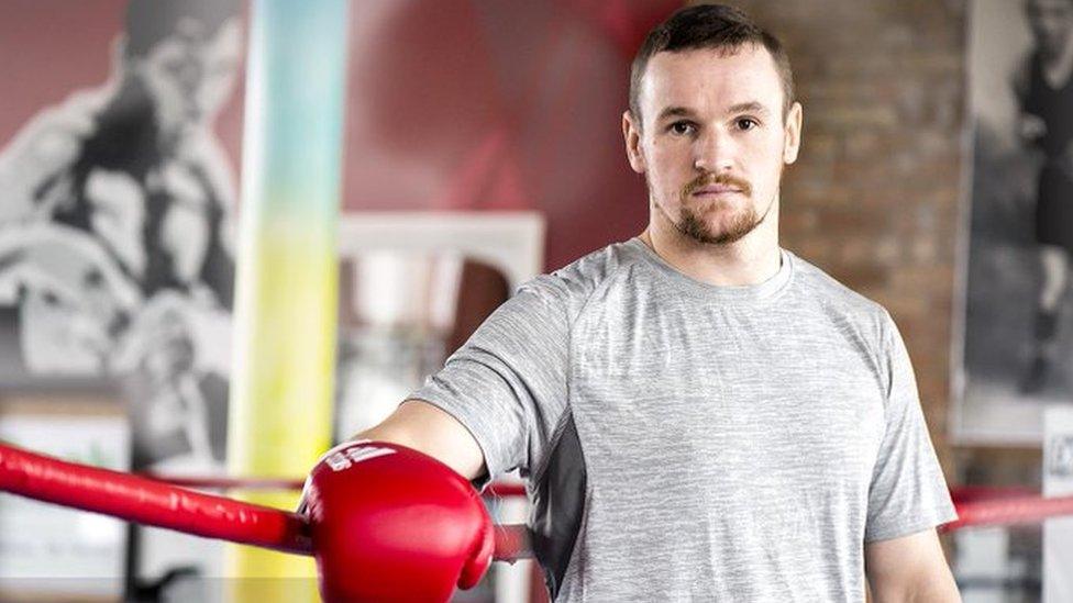 Sean McGlinchey posing in a boxing ring