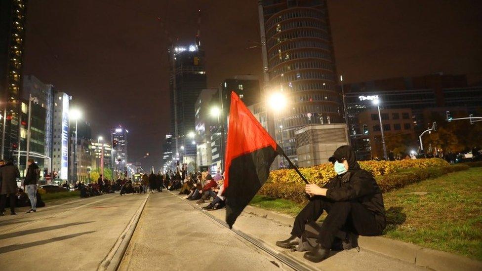 A protester in Warsaw