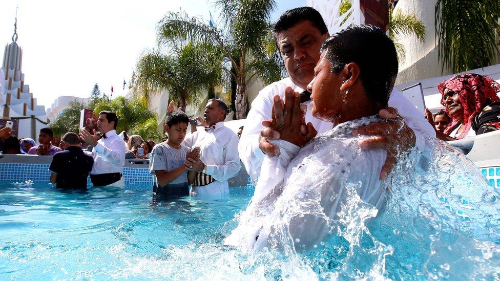 Followers of the Mexican-based Pentecostal church Light of the World, participate in a baptism ceremony in Guadalajara