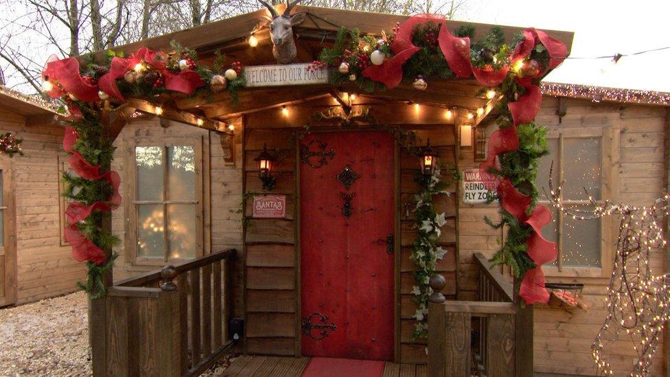 A Christmas grotto decorated with Christmas decorations