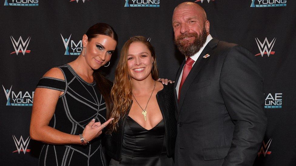 Stephanie McMahon, Ronda Rousey and Triple H