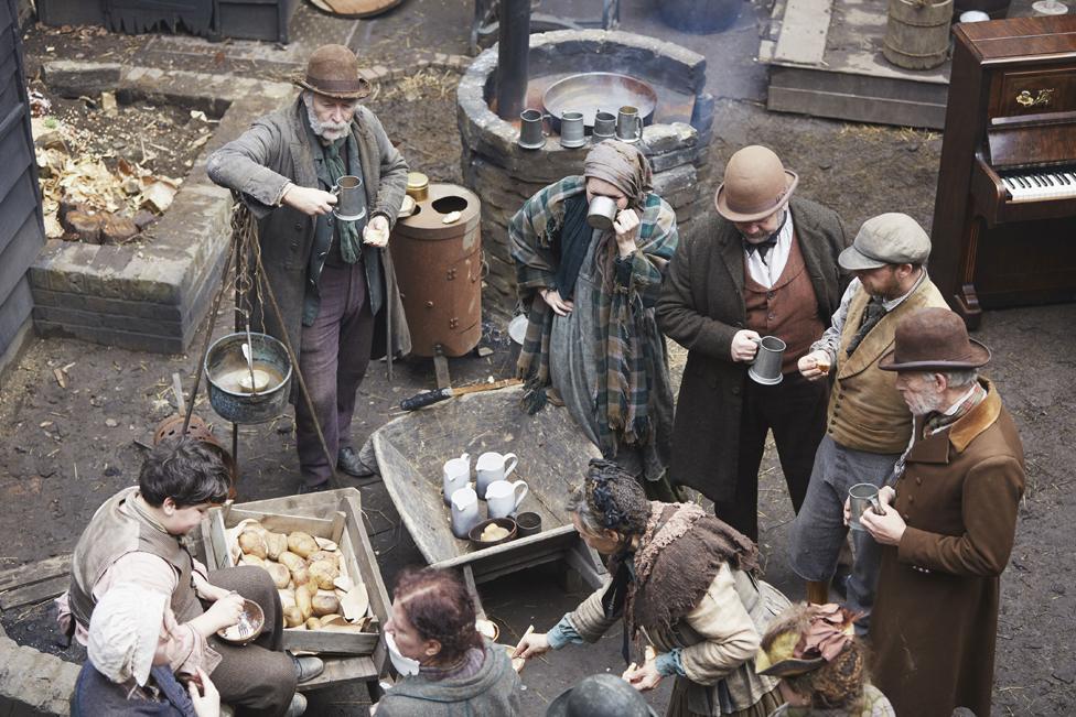 People dressed as Victorians taking part in The Victorian Slum