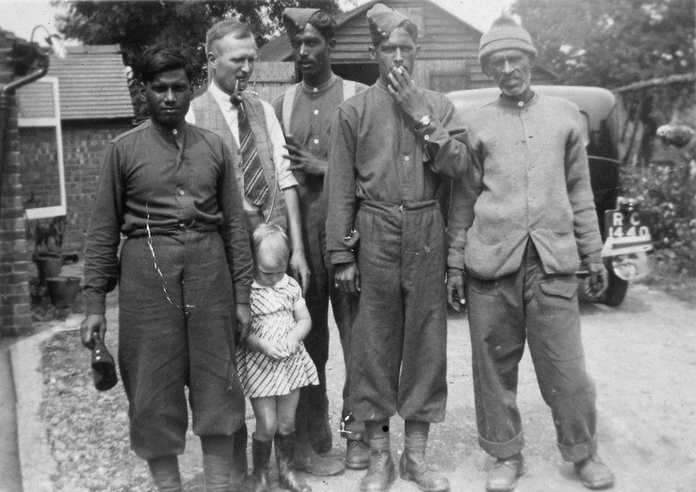 Kundan Lall, Herbert Foster, Betty Foster and three unidentified sepoys at the Fosters’ house near Shirley, autumn