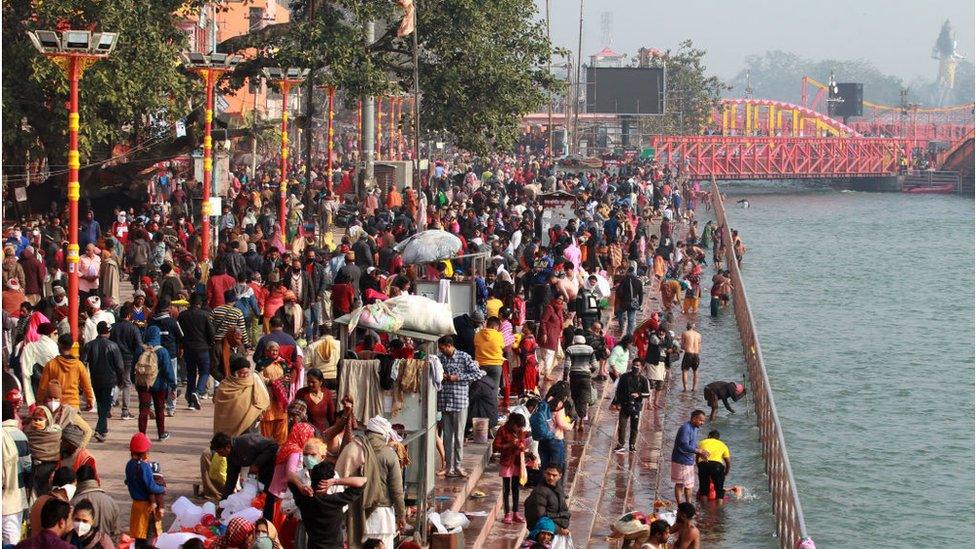 Hindu devotees on the banks of the river Ganges at Haridwar on 14 January