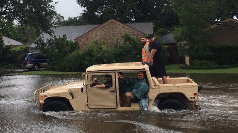 People in flooded Bear Creek Village, Houston (pic: Joel Gunter, BBC)