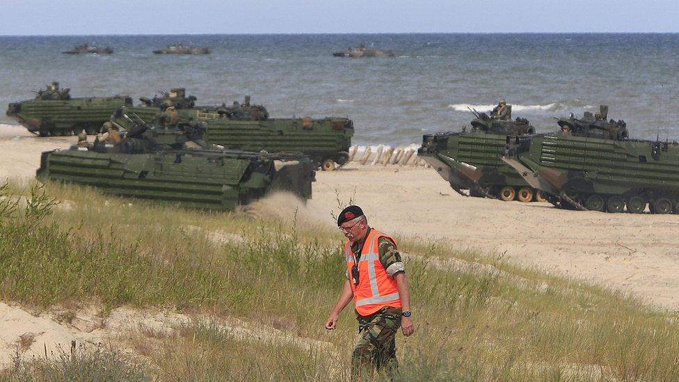 A Nato military exercise on a beach in Poland