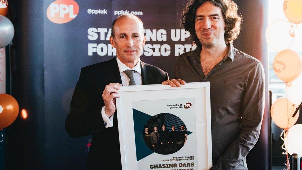 Gary Lightbody receives his award