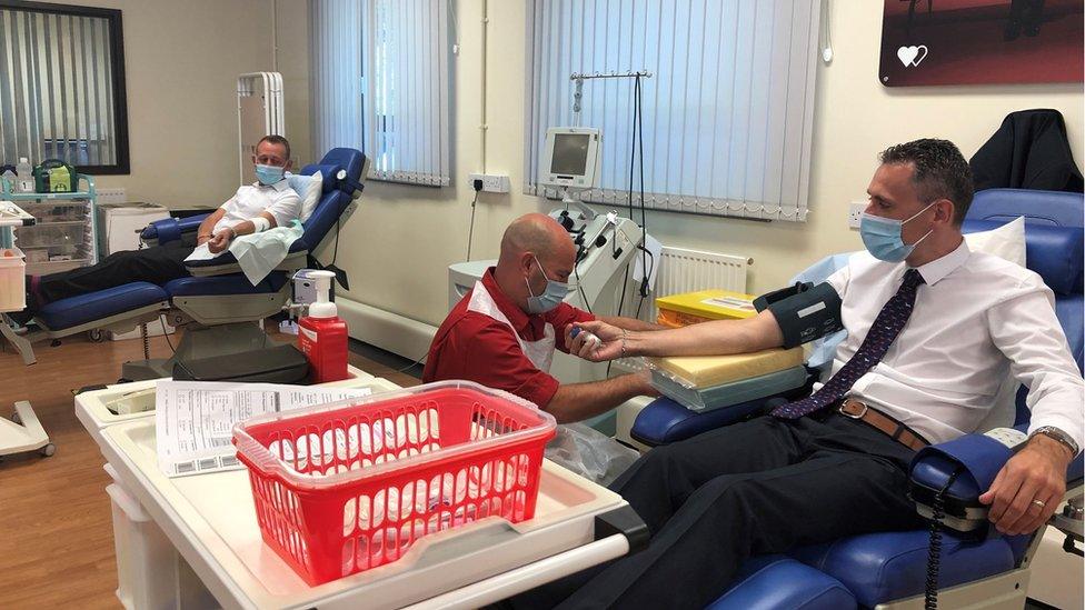 Martin and Carl giving blood