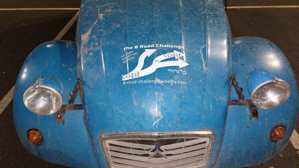 Dirty bonnet of a blue 2CV with B road challenge logo