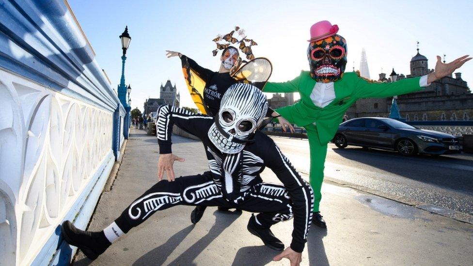 Traditional Mexican parade characters on Tower Bridge, London - 1 November