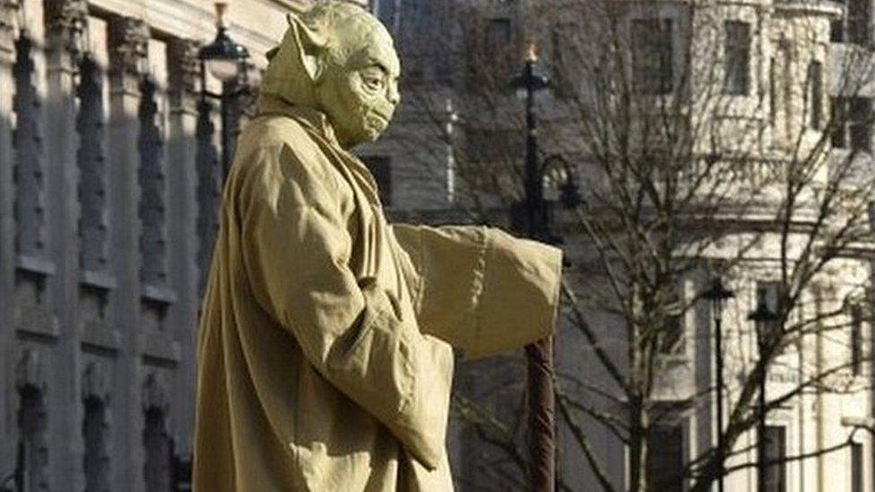 Floating Yoda street performer